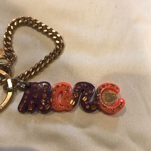 Marc Jacobs orange and purple MARC gold hardware keychain